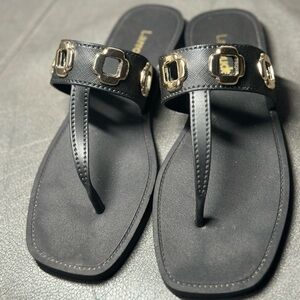 Larroude Women's Milan Grommet Sandals in Black and Gold